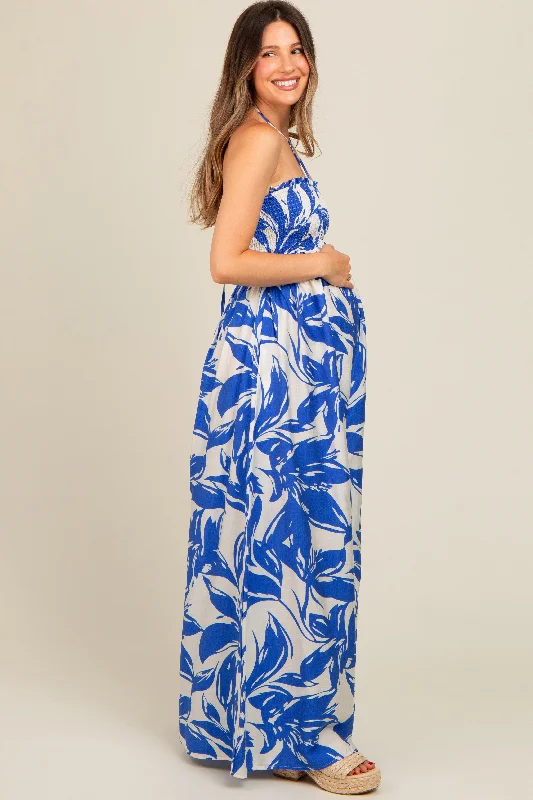 royal-blue-tropical-print-cutout-smocked-maternity-jumpsuit